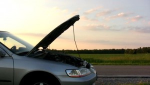 stock-footage-man-with-broken-down-car-on-side-of-road